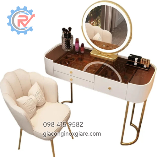 Bàn trang điểm hiện đại khung inox mạ vàng mặt kính sang trọng.